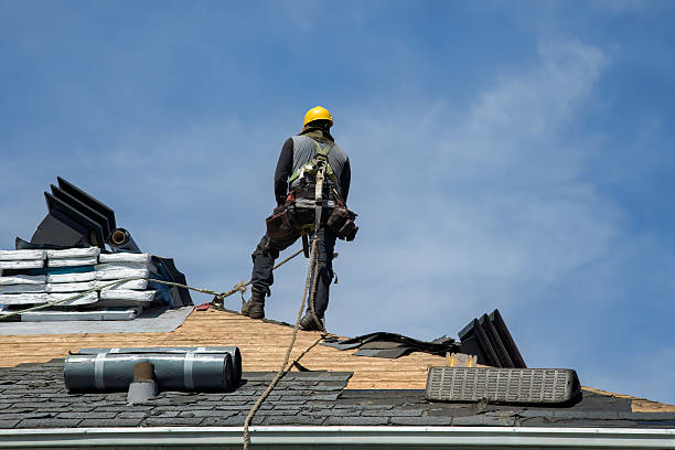Professional Roof Replacement technician working in Northbridge, MA